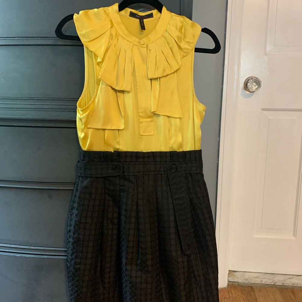 BCBG Maxazria size 4 dress with gold/yellow blouse and black bottom.